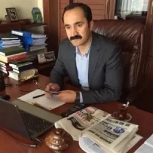 Mensur Işık portresi
